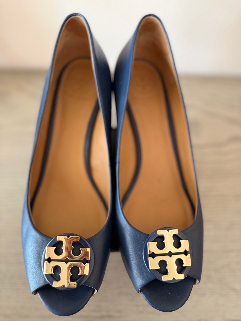 Tory Burch Navy Peep-Toe Pumps with Gold Logo Medallion